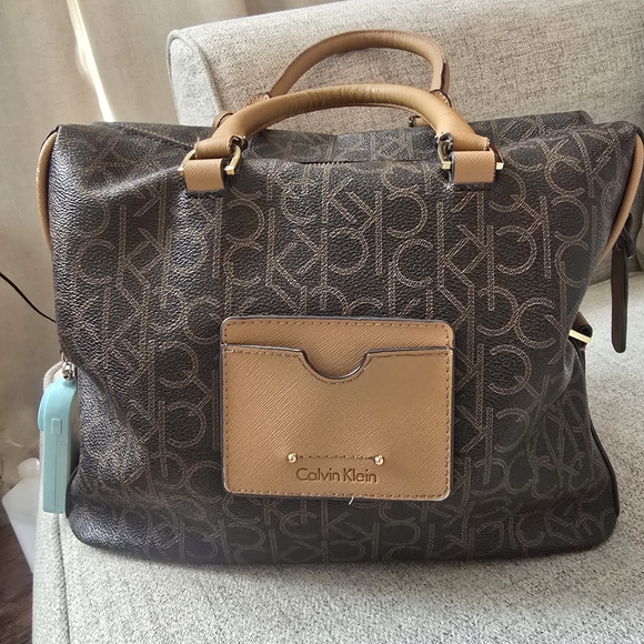 Calvin Klein Handbags - Calvin Klein Brown Monogram Bag